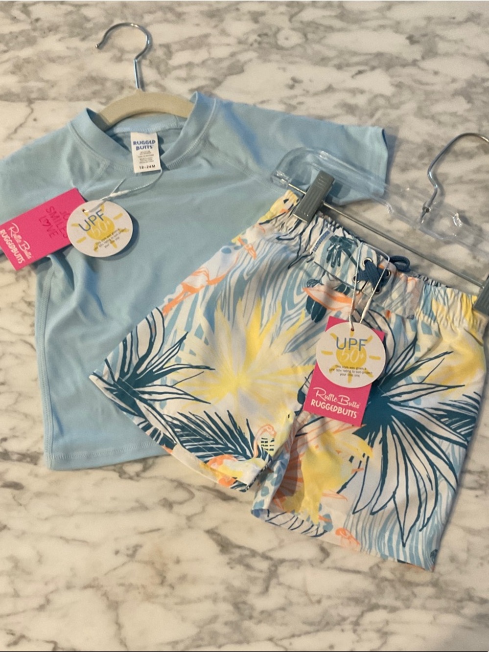 RuffleButts Kids UPF Swim Rashguard Set - Blue Top & Tropical Print Shorts